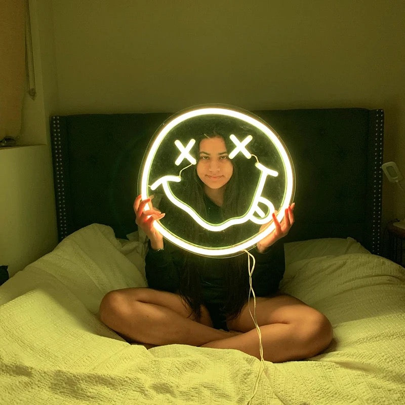 Smiley face neon sign